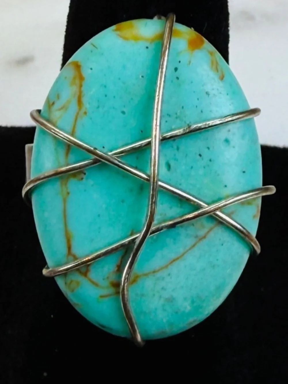 Aged silvertone, wire wrapped blue center size 6 adjustable costume ring